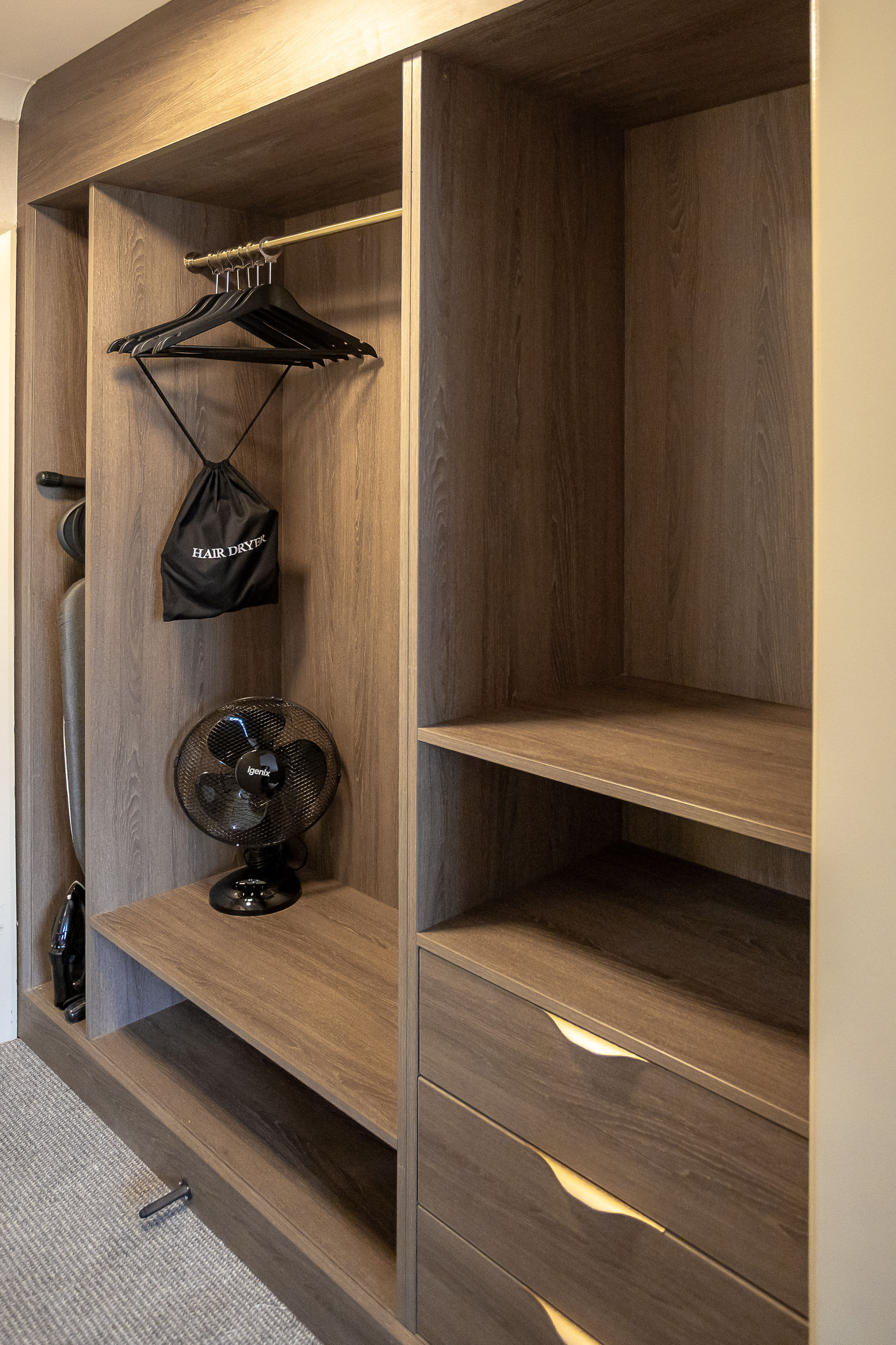 Cedar Court Hotel Harrogate refurbished bedroom — bespoke headboard surround with illustrated botanical panel and fitted bedside joinery by Novus